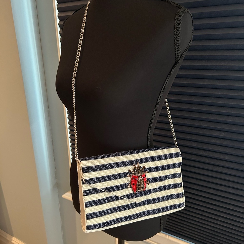 Tiana Striped Navy and White Clutch with Ladybug Accent